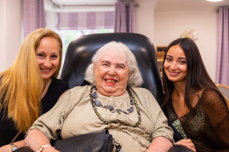 resident smile with family