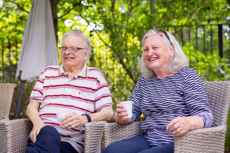resident sitting down with family